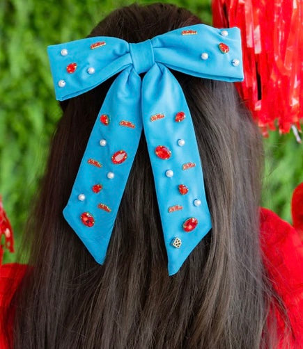 
                  
                    Brianna Cannon Powder Blue Ole Miss Bow Barrette
                  
                